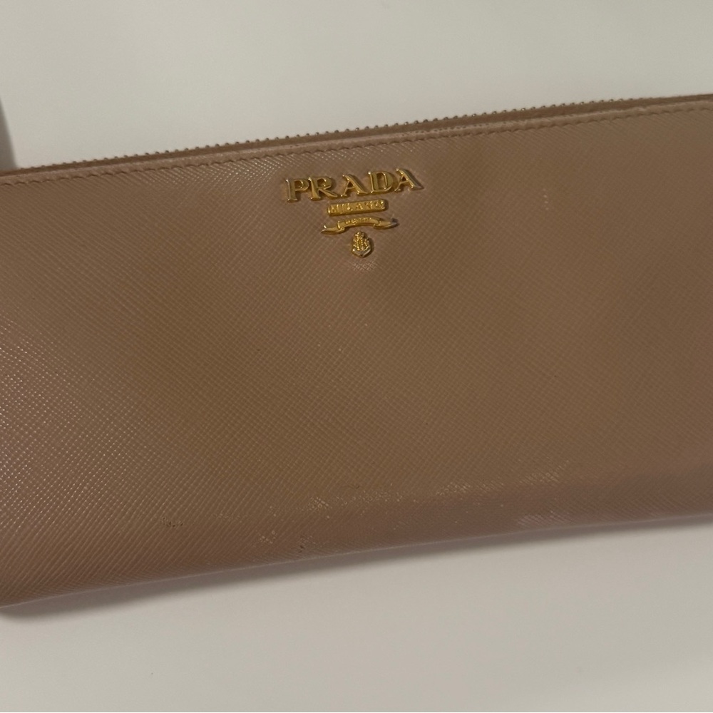 Prada Beige Leather Zippy wallet with Gold Accents